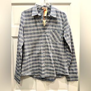 Women’s long sleeved button up shirt.